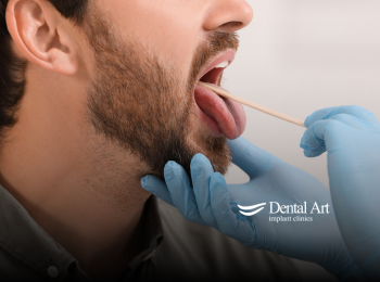 A person at the dentists office getting their oral health checked.