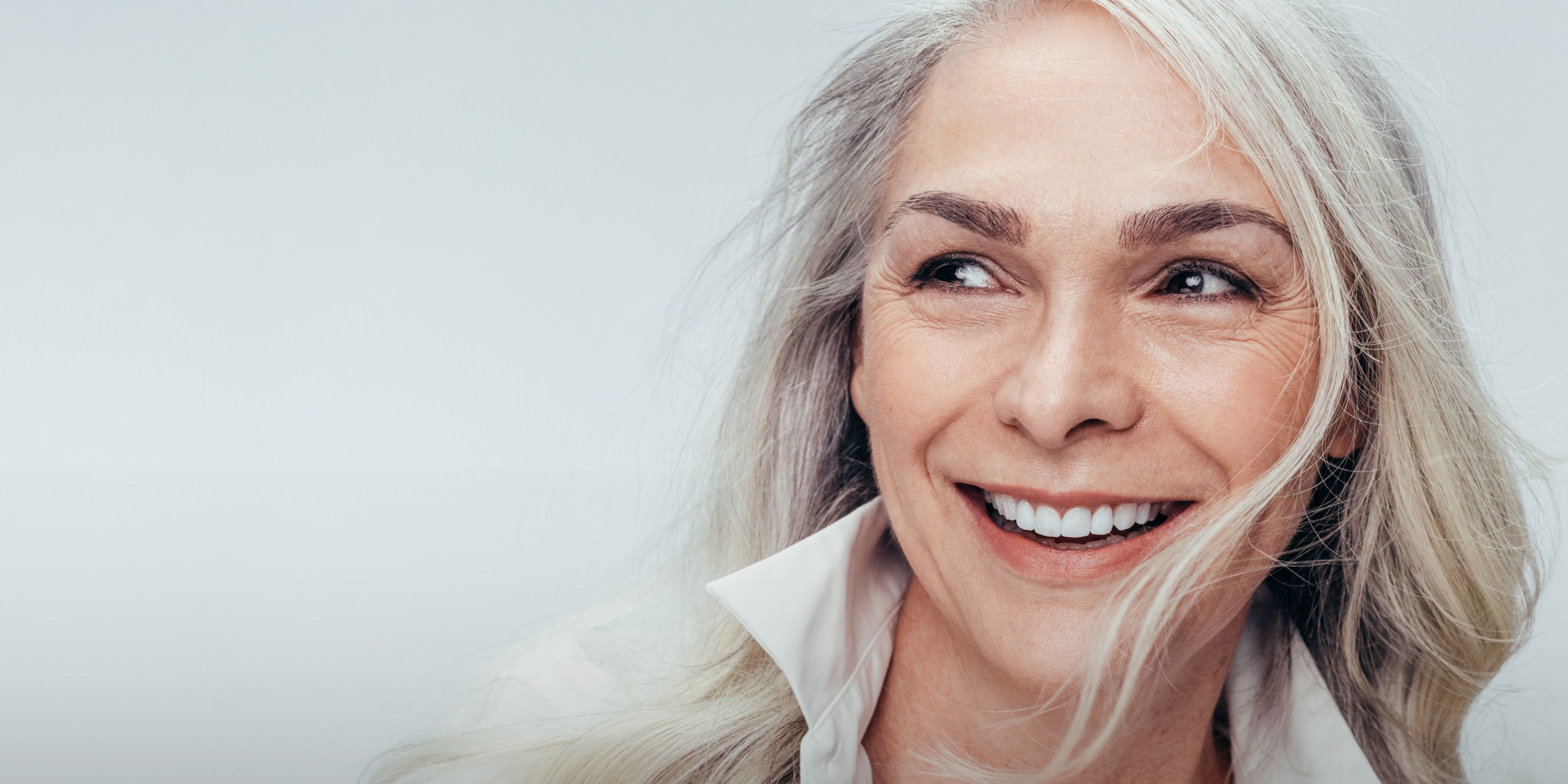 A woman smiling